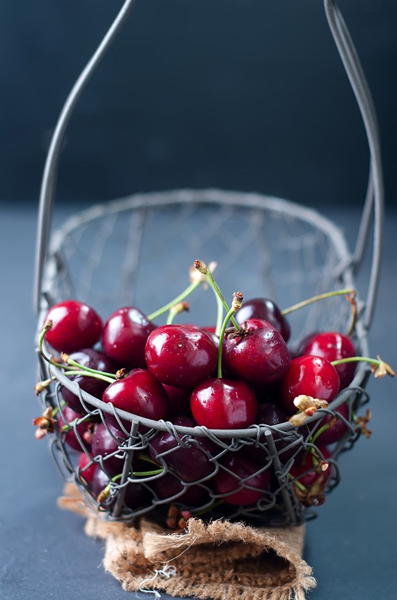 cherries-on-black-table-PBPSGKH-Small